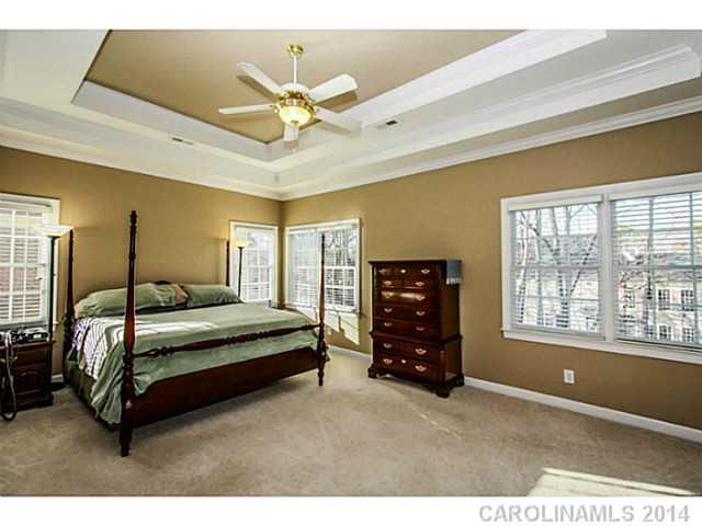 3413 Rhett Butler Place Charlotte, NC 28270 - Photo 11 of 15 a spacious bedroom with a bed and window
