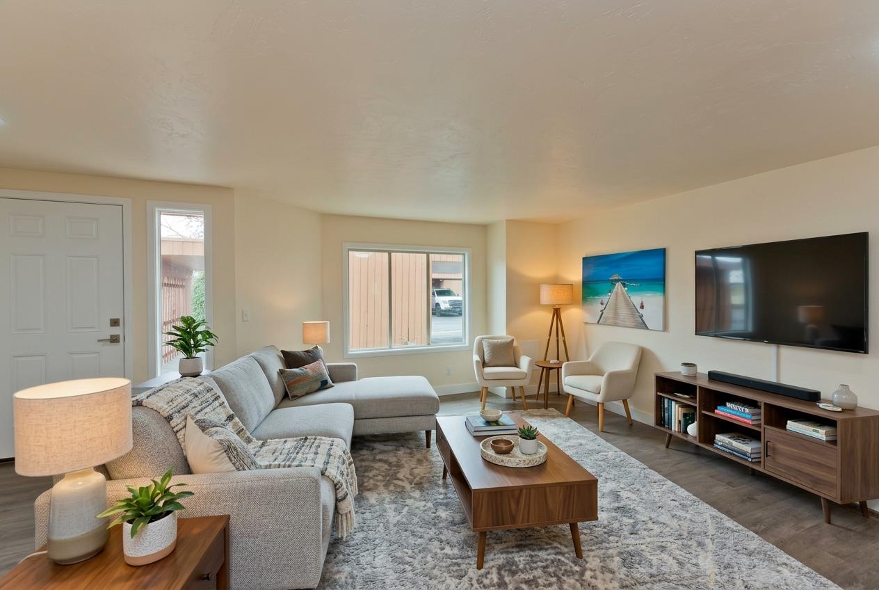 575-28 28 1/2 Road, Unit 44 Grand Junction, CO 81501 - Photo 2 of 39 a living room with furniture and a flat screen tv
