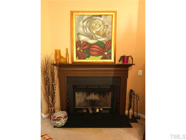 1621 Cricket Ridge Drive Raleigh, NC 27610 - Photo 5 of 25 Beautiful gas log fireplace in Living room, ready and waiting for you to enjoy.