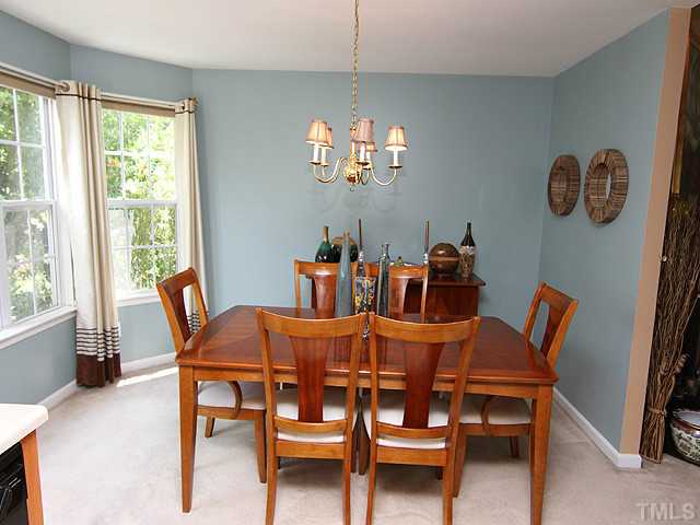1621 Cricket Ridge Drive Raleigh, NC 27610 - Photo 10 of 25 Lots of natural light in this dining room, neutral carpet, and ready for entertaining