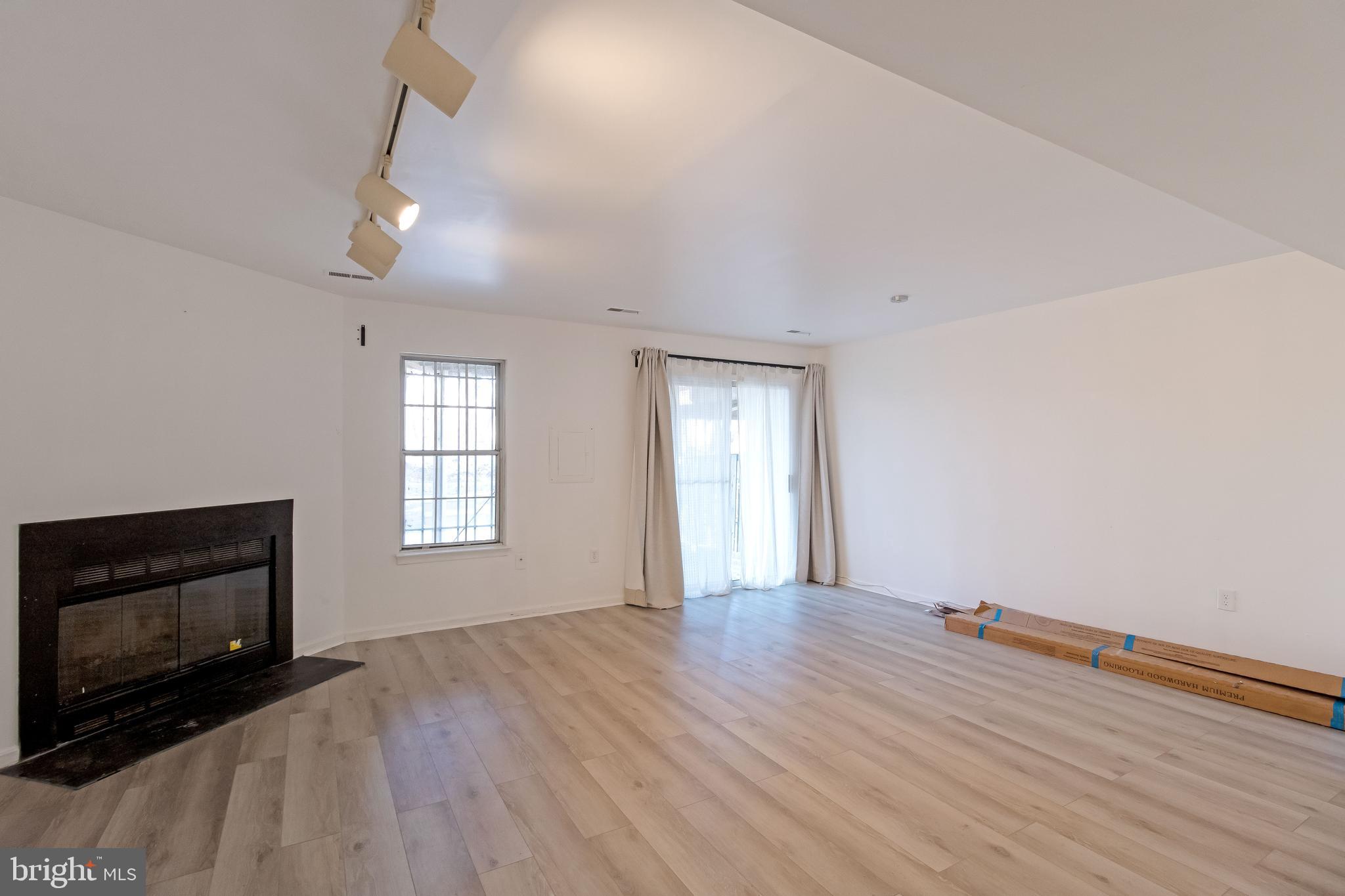 10340 Castlehedge Terrace Silver Spring, MD 20902 - Photo 50 of 62 Lower Level Family Room with Fireplace