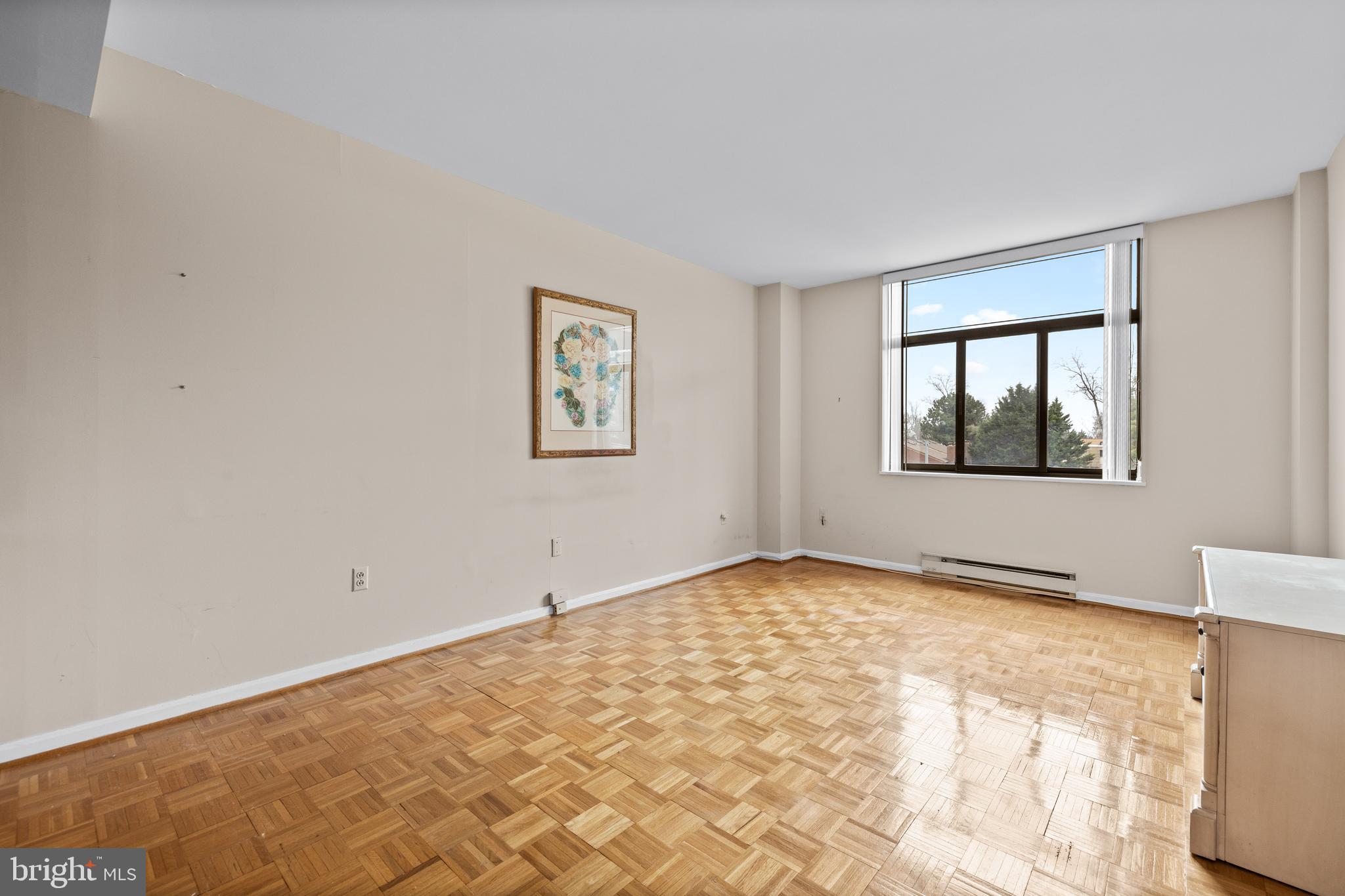 1 Slade Avenue, Unit 304 Baltimore, MD 21208 - Photo 27 of 44 a view of an empty room with a window