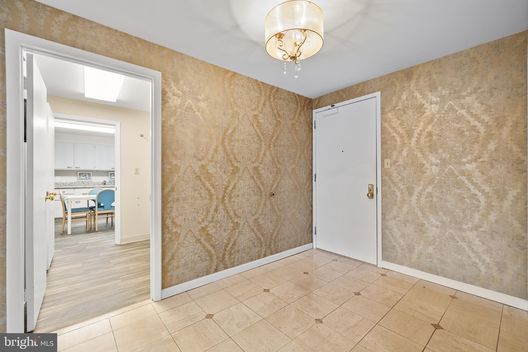 1 Slade Avenue, Unit 304 Baltimore, MD 21208 - Photo 8 of 44 a view of a hallway to rooms