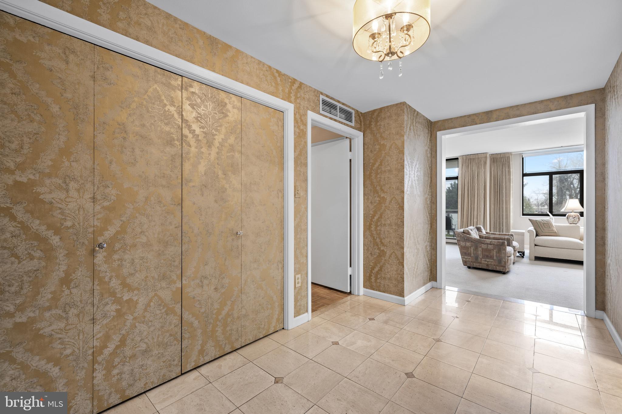 1 Slade Avenue, Unit 304 Baltimore, MD 21208 - Photo 10 of 44 a view of a hallway with interior of the house