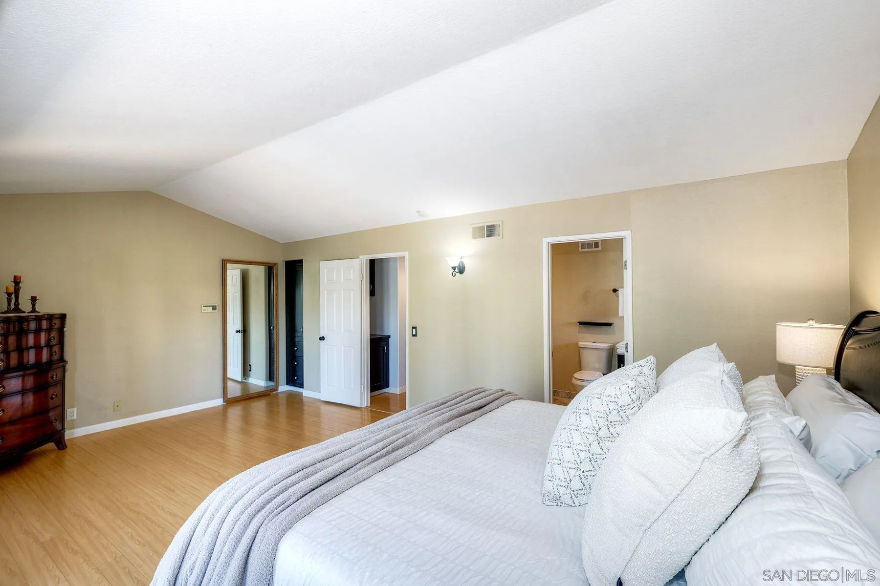 13976 Country Creek Road Poway, CA 92064 - Photo 18 of 40 a bedroom with a bed and a cabinets