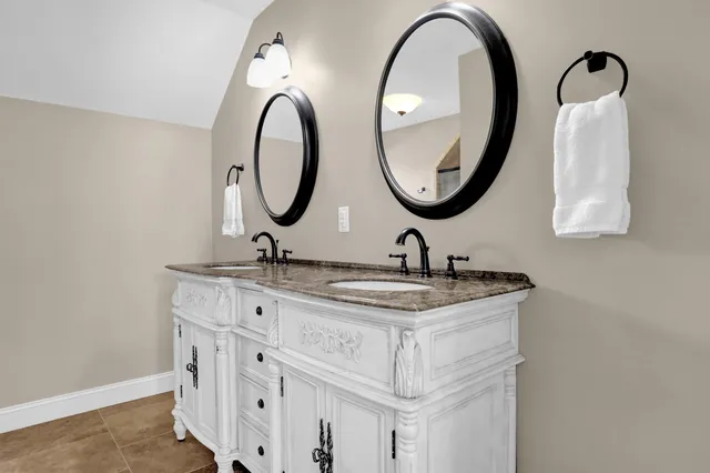 a view of a balcony with wooden floor