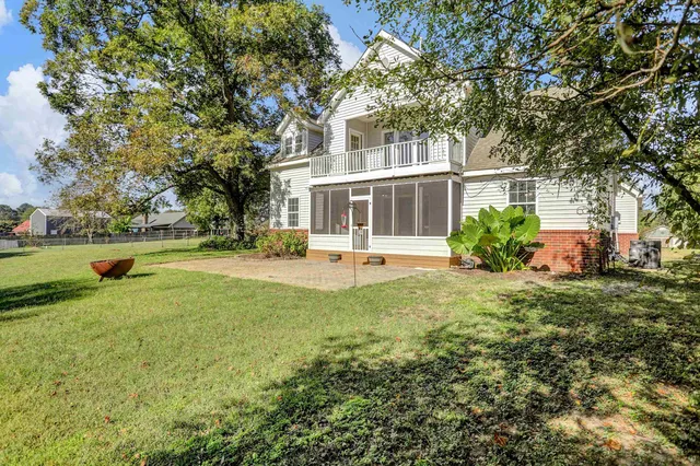 a view of a golf course with a trees