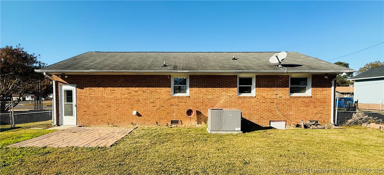 611 Reggie Court Spring Lake, NC 28390 - Photo 19 of 20 a front view of a house with a garage
