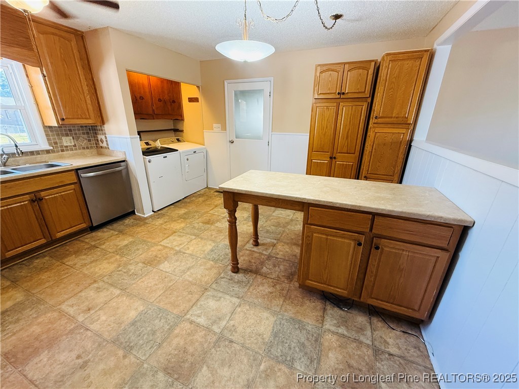 611 Reggie Court Spring Lake, NC 28390 - Photo 7 of 20 a room with furniture a flat screen tv and a refrigerator