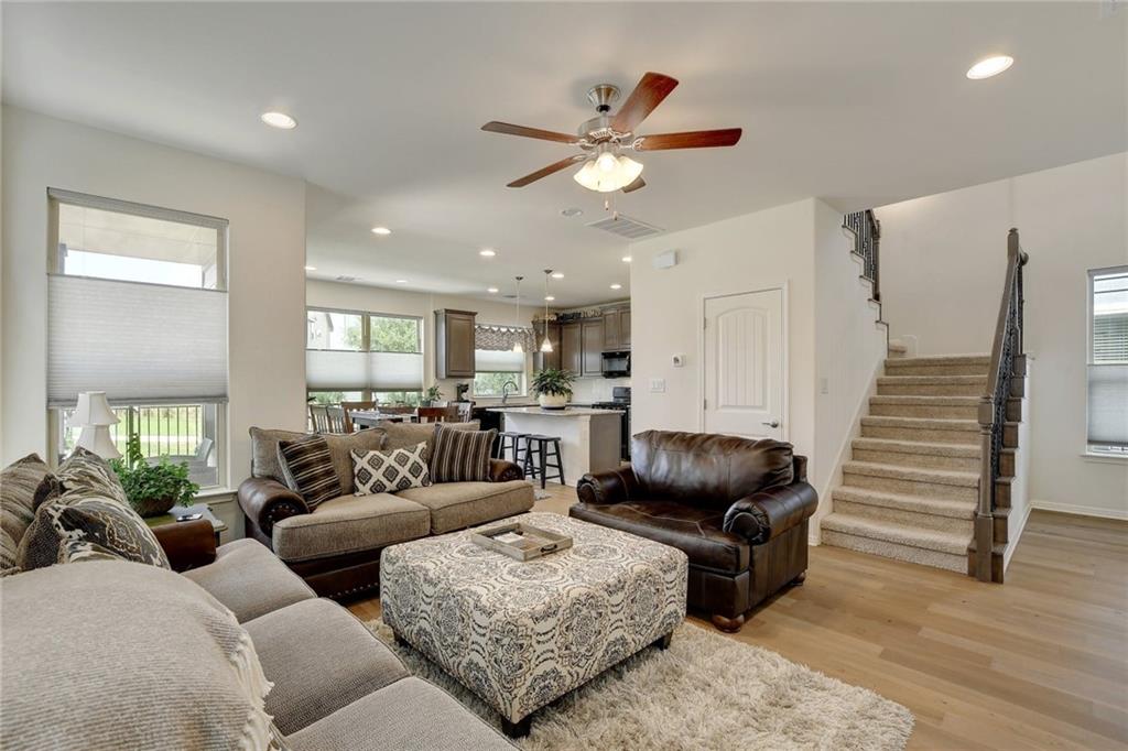 228 Simon Kyle, TX 78640 - Photo 10 of 35 Living area featuring a ceiling fan, light wood-style floors, and recessed lighting