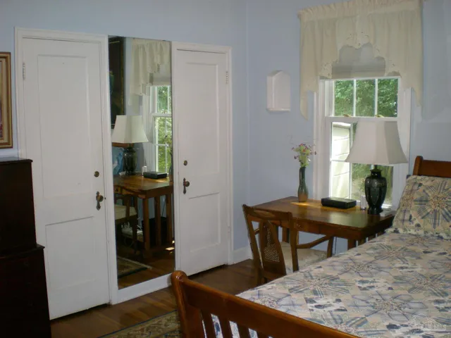 a view of a workspace with furniture