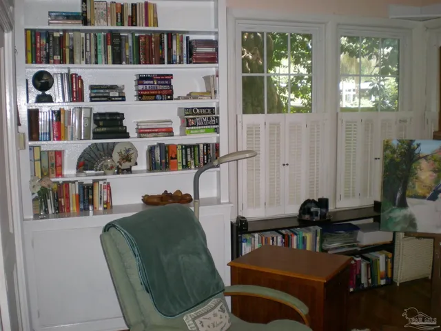 a room with furniture and a fireplace