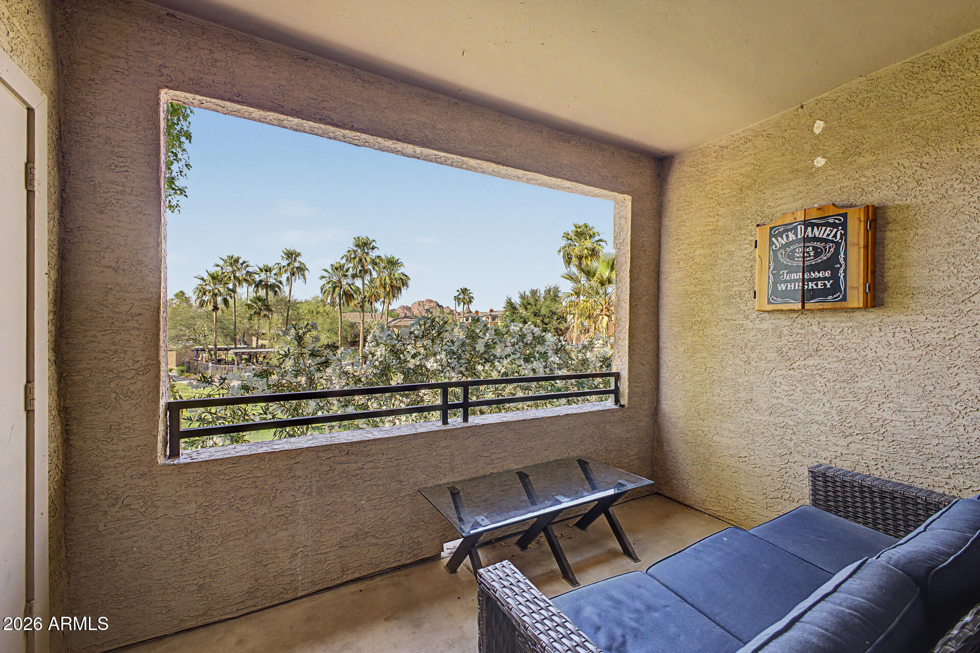 5401 East Van Buren Street, Unit 3017 Phoenix, AZ 85008 - Photo 17 of 37 a view of a room with furniture and a window