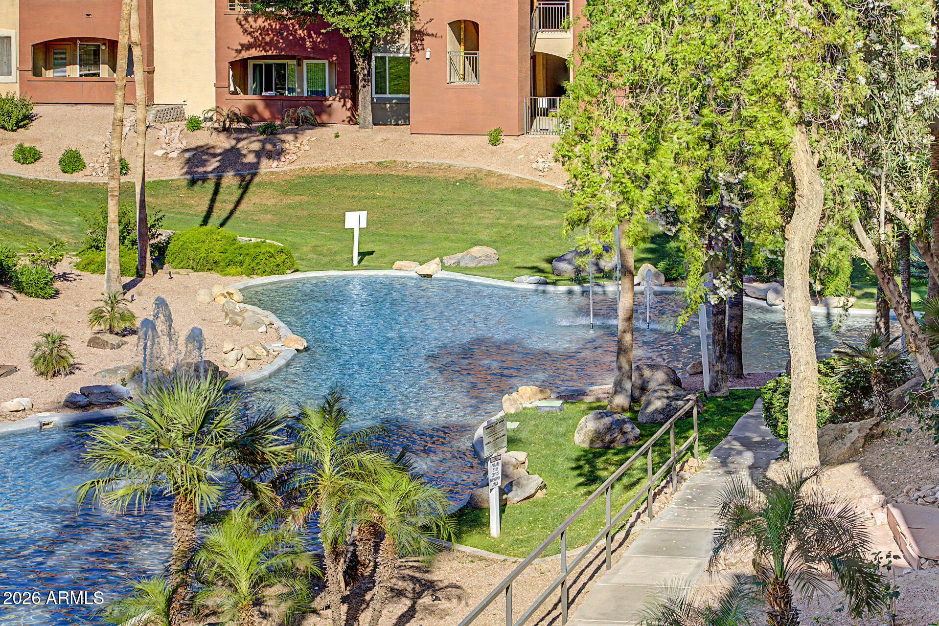 5401 East Van Buren Street, Unit 3017 Phoenix, AZ 85008 - Photo 24 of 37 an aerial view of a house with a yard basket ball court and outdoor seating