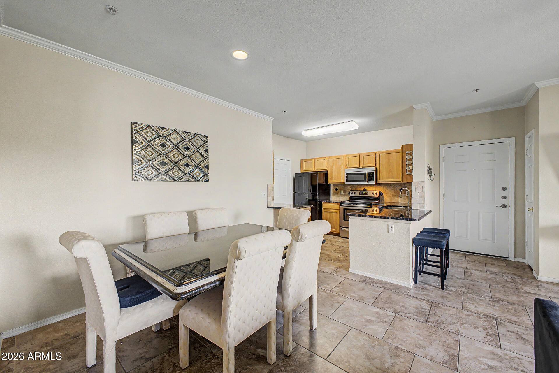 5401 East Van Buren Street, Unit 3017 Phoenix, AZ 85008 - Photo 5 of 37 a view of a dining room with furniture