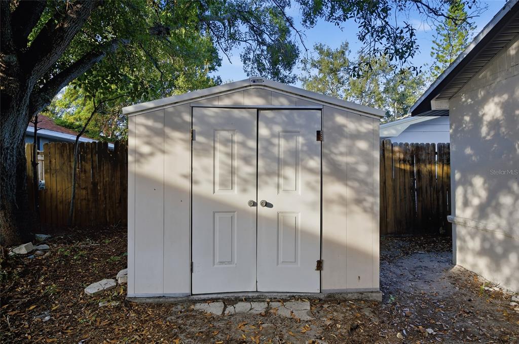 1908 Macomber Avenue Clearwater, FL 33755 - Photo 24 of 24 a backyard of a house with lots of green space