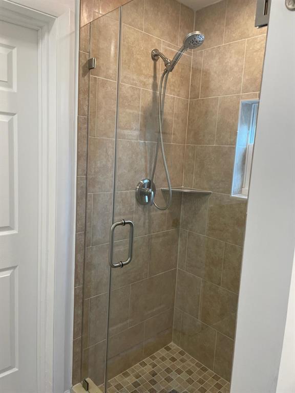 5911 Northeast 15th Avenue Fort Lauderdale, FL 33334 - Photo 11 of 21 a bathroom with a shower