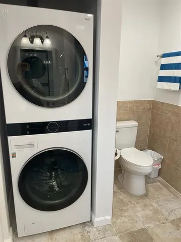 a bathroom with a toilet and a sink