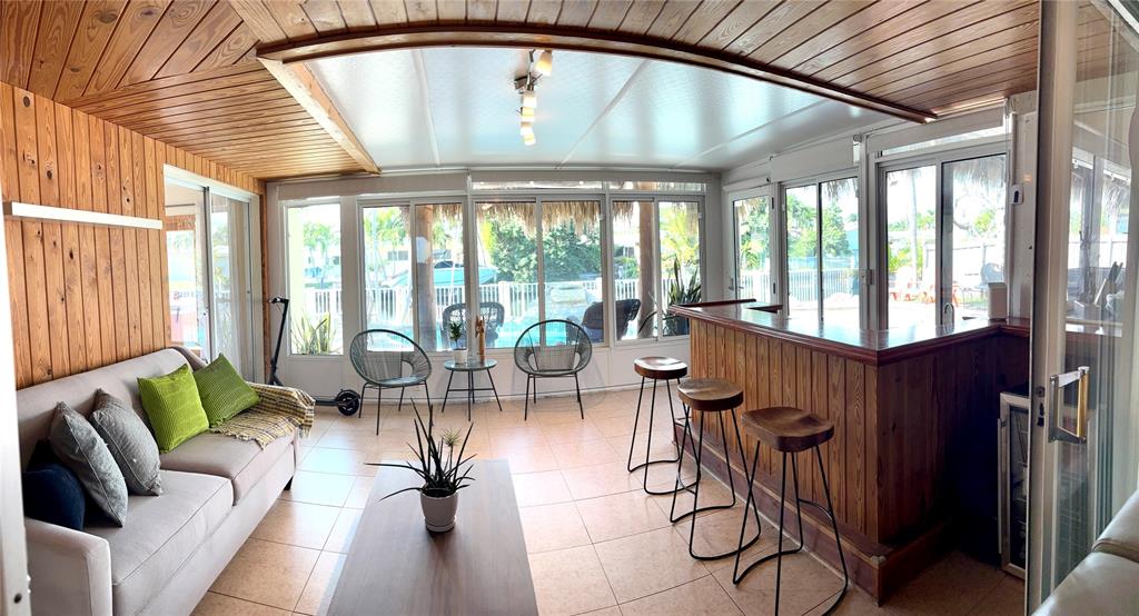 5911 Northeast 15th Avenue Fort Lauderdale, FL 33334 - Photo 20 of 21 a very nice looking living room with a large window