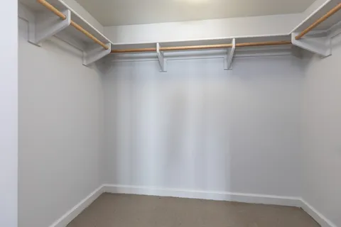 a view of an empty walk in closet