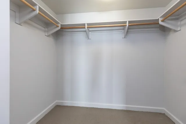 a view of an empty walk in closet