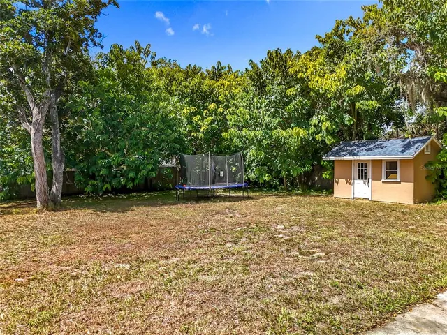 a house with trees in front of it