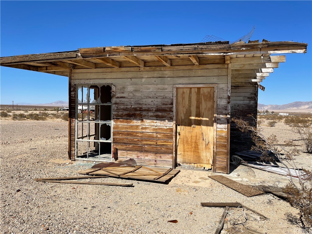 1082 Donavan Twentynine Palms, CA 92277 - Photo 2 of 8 a view of a house with a ocean view