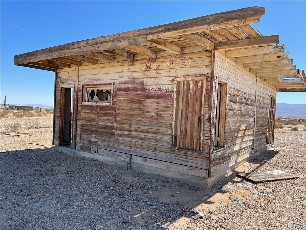 1082 Donavan Twentynine Palms, CA 92277 - Photo 4 of 8 a view of a house with a yard