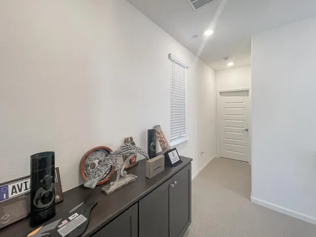 a living room with furniture and window