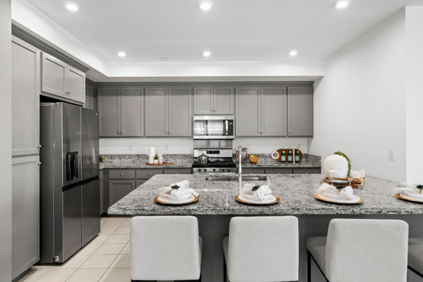 5465 Dublin Boulevard Dublin, CA 94568 - Photo 13 of 37 a kitchen with refrigerator and microwave