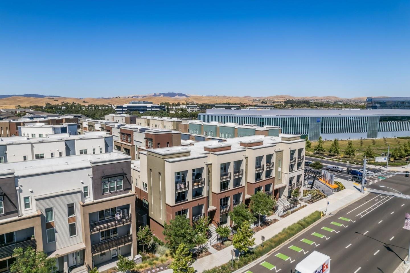 5465 Dublin Boulevard Dublin, CA 94568 - Photo 33 of 37 a view of a building with a lot of trees in front of it