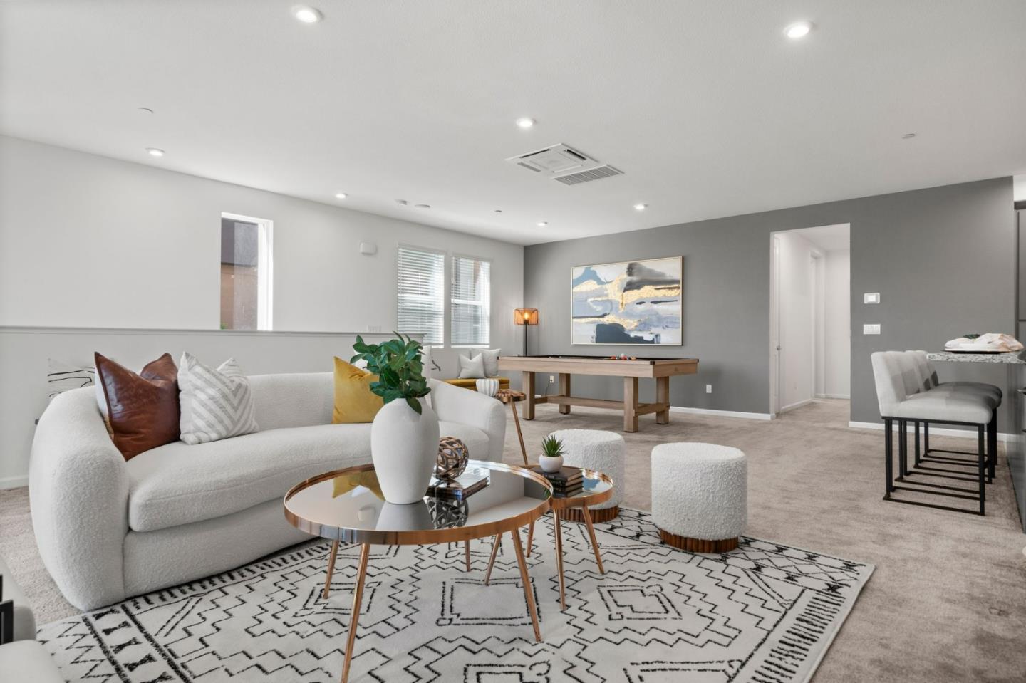 5465 Dublin Boulevard Dublin, CA 94568 - Photo 10 of 37 a living room with furniture a rug and a table