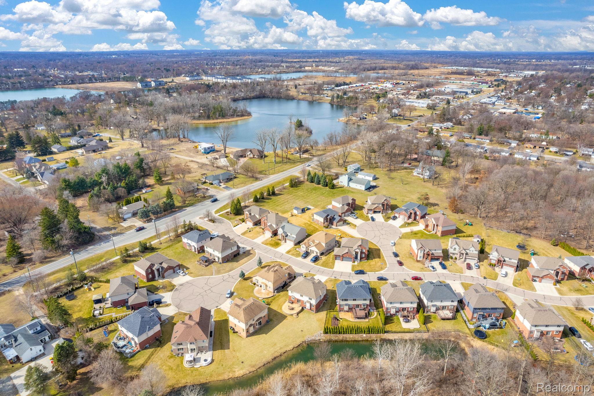 4122 Hawks Nest Road Utica, MI 48317 - Photo 74 of 74 Aerial perspective of suburban area featuring a nearby body of water