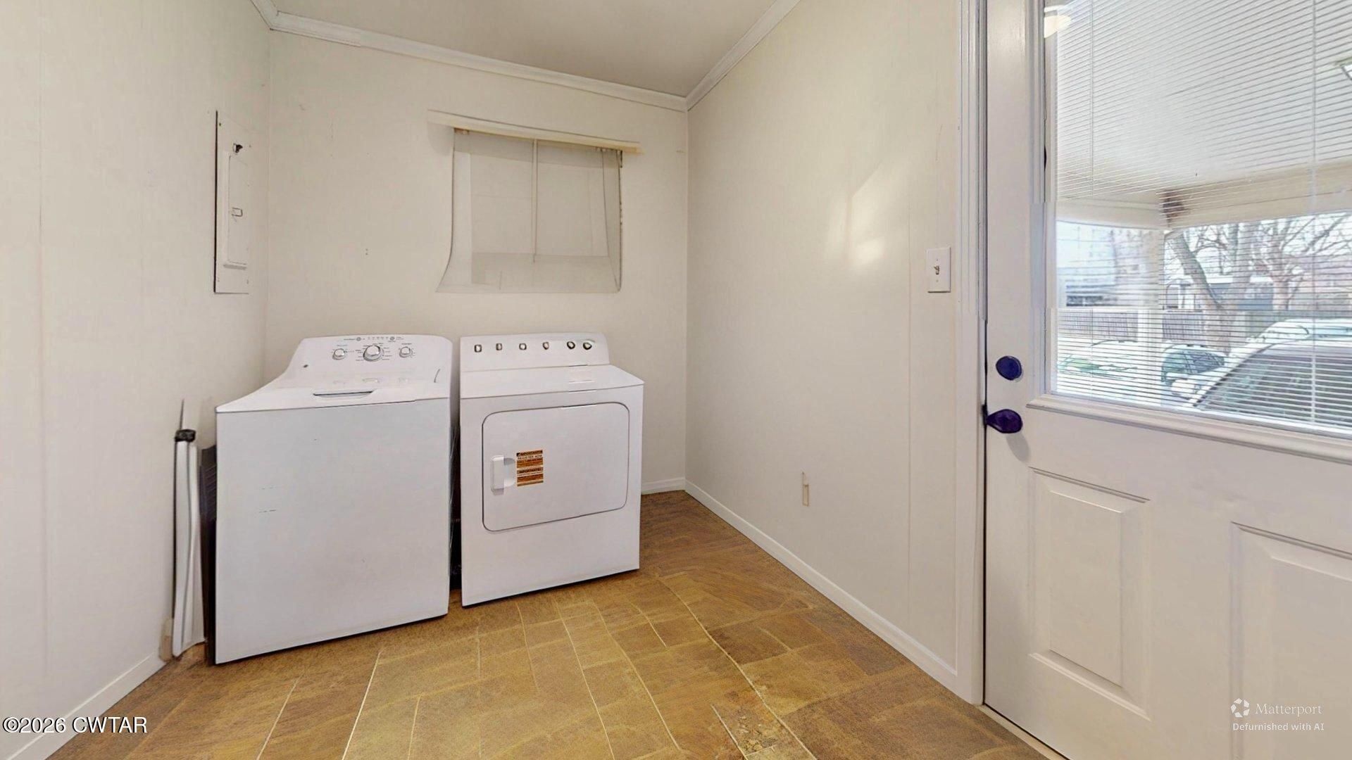 72 Palmer Subdivision Road Dyersburg, TN 38024 - Photo 12 of 14 a utility room with dryer and washer