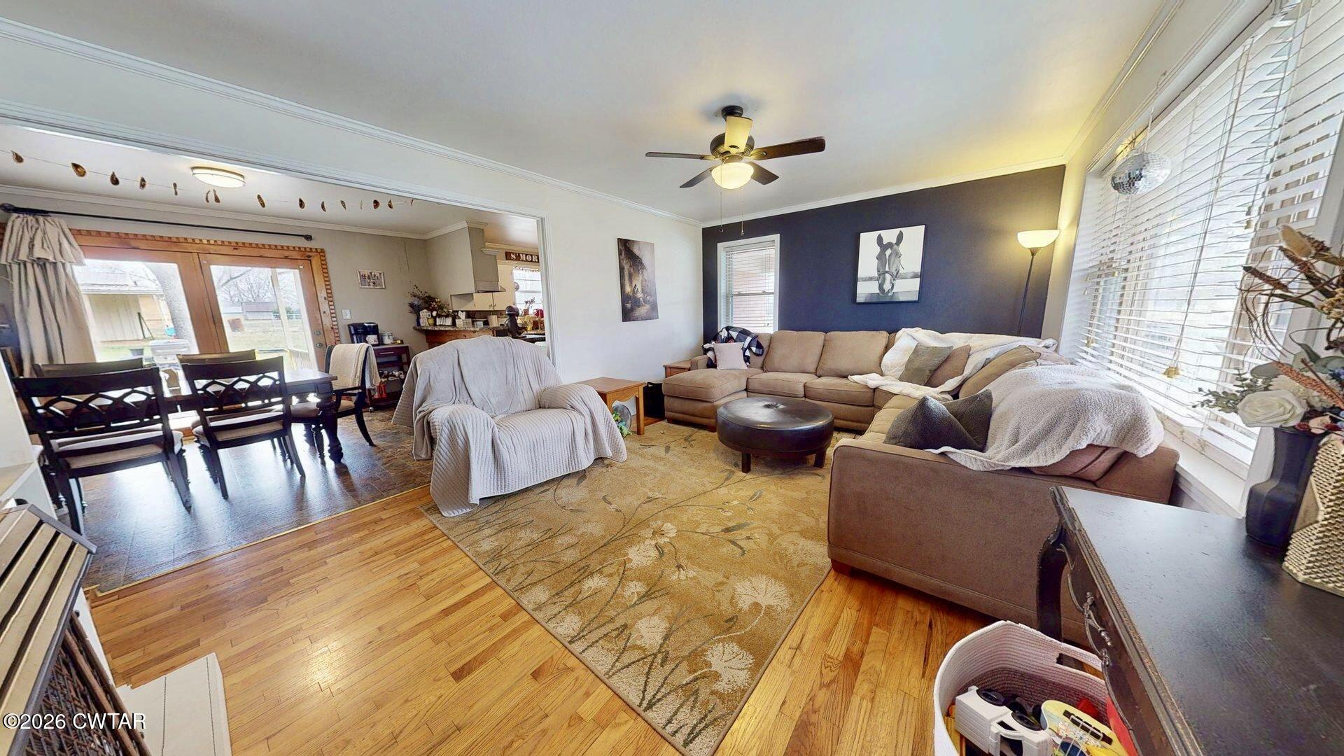 72 Palmer Subdivision Road Dyersburg, TN 38024 - Photo 2 of 14 a living room with furniture and a large window