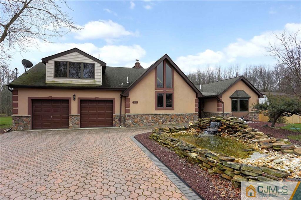 342 Pleasant Valley Road Old Bridge, NJ 08857 - Photo 1 of 25 a front view of a house with yard