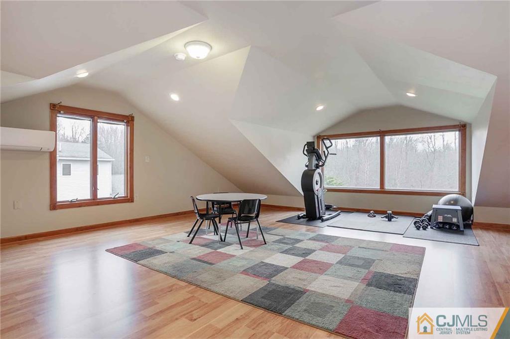 342 Pleasant Valley Road Old Bridge, NJ 08857 - Photo 8 of 25 a view of a room with gym equipment