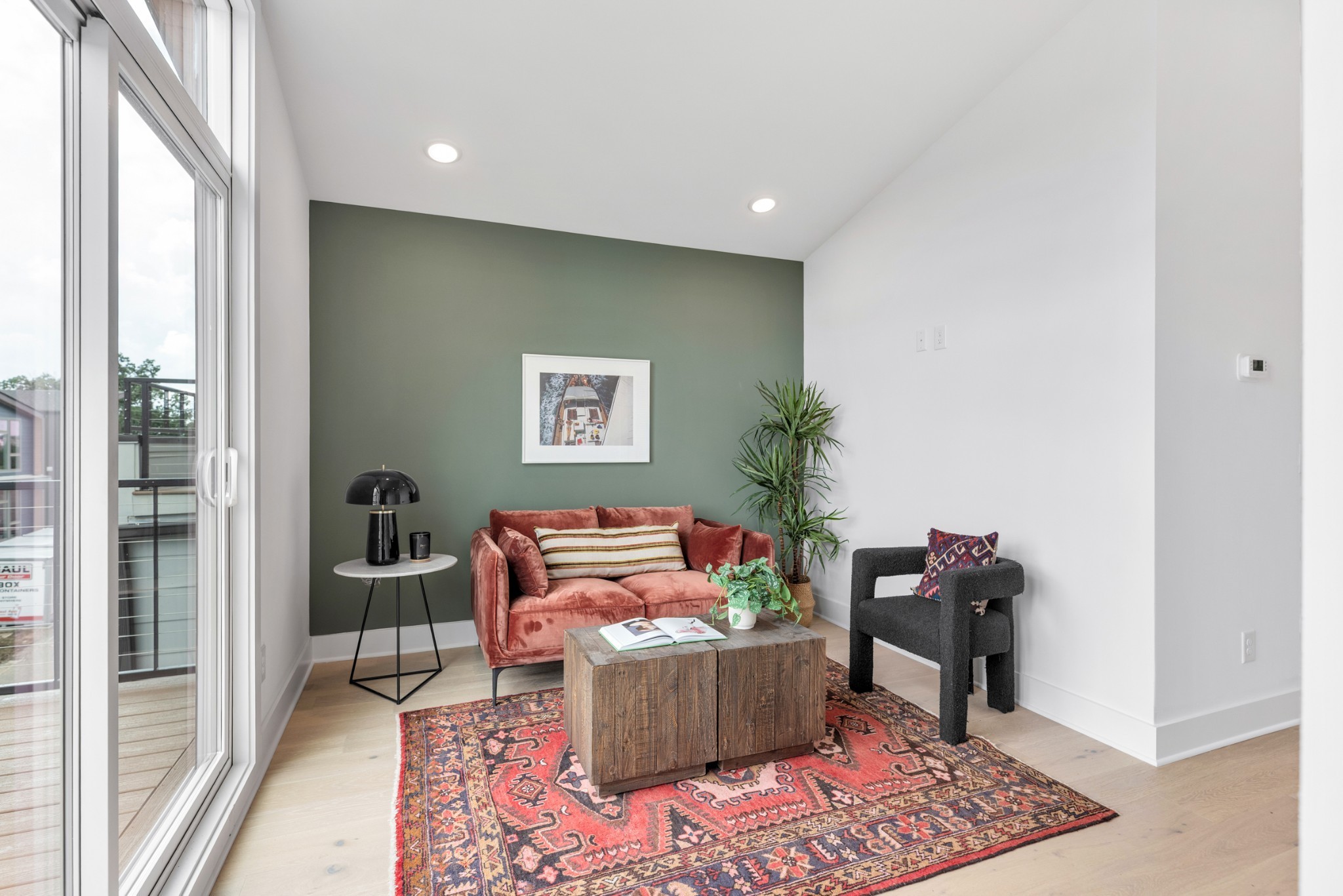 3019 Edwin Street Nashville, TN 37207 - Photo 29 of 51 a living room with a couch and a potted plant