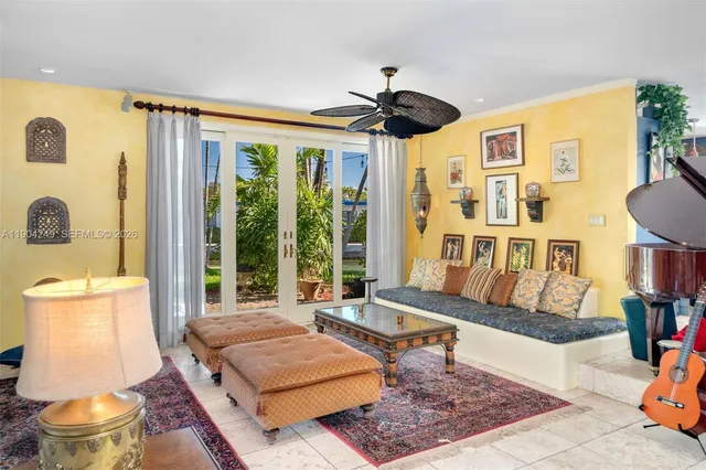 a view of swimming pool with outdoor seating and a potted plant
