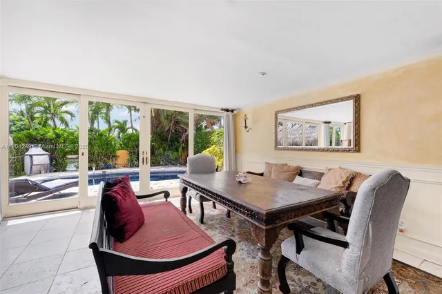 a view of a lake with houses in the back