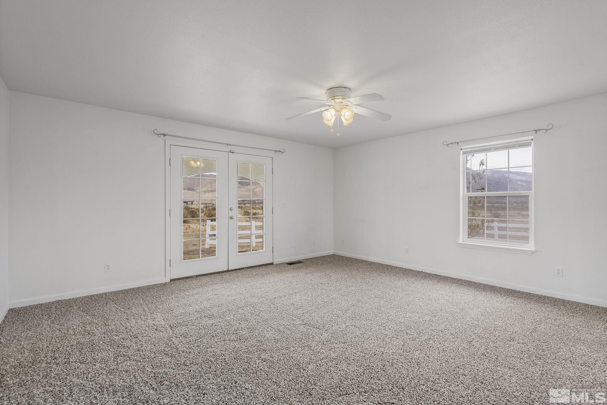 15560 North Red Rock Road Reno, NV 89508 - Photo 16 of 28 a view of an empty room with a window