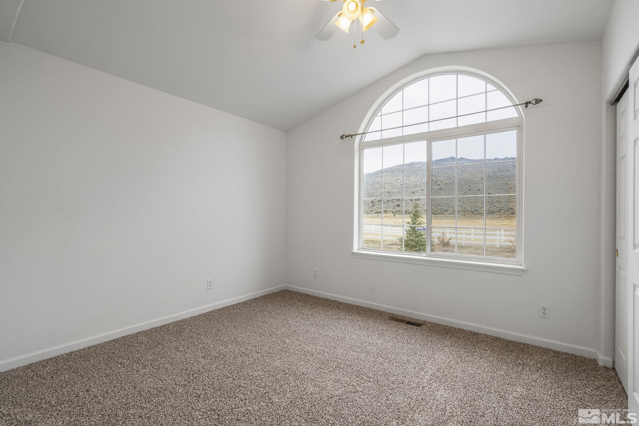 15560 North Red Rock Road Reno, NV 89508 - Photo 19 of 28 an empty room with a window