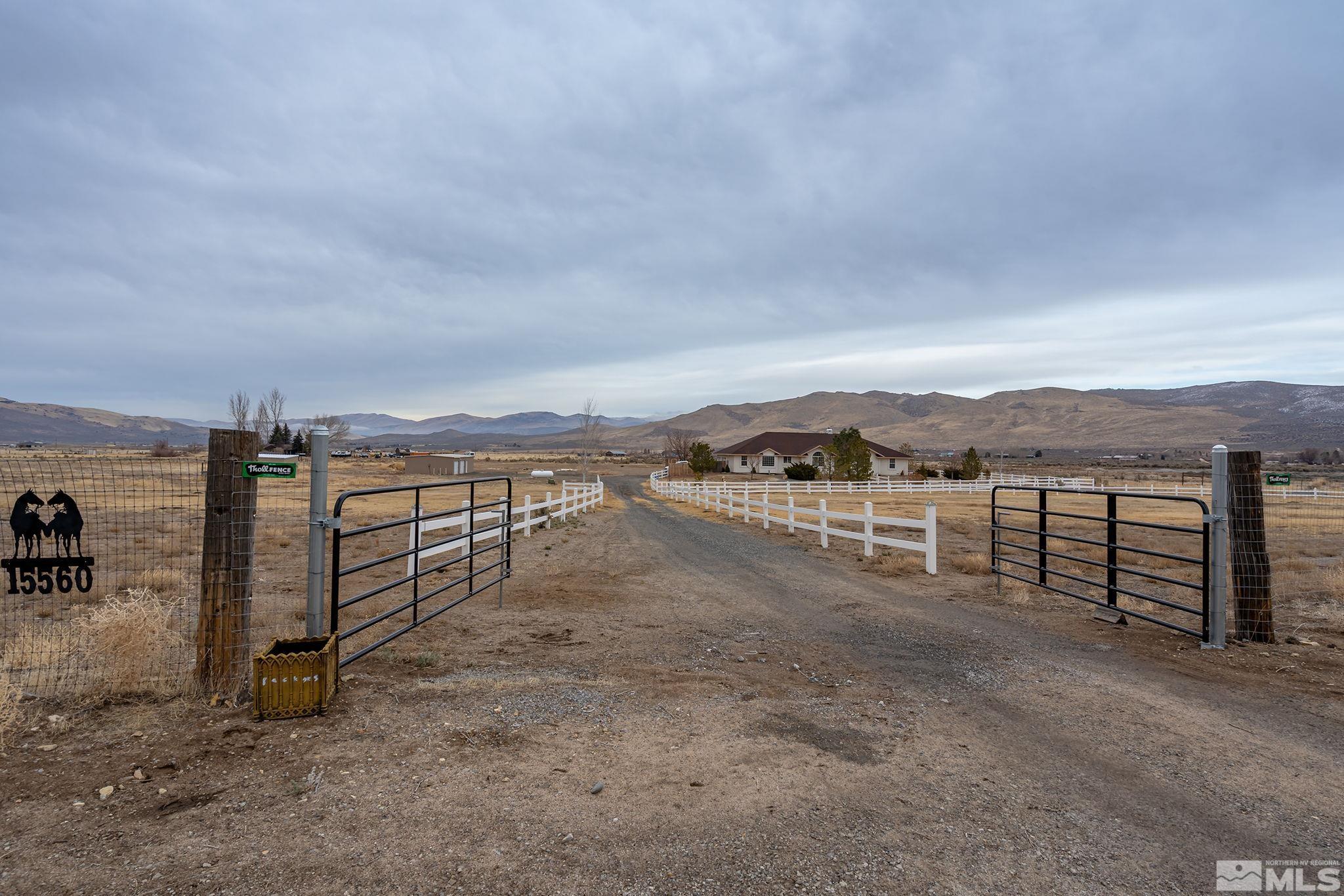 15560 North Red Rock Road Reno, NV 89508 - Photo 2 of 28 a view of a terrace with a lake