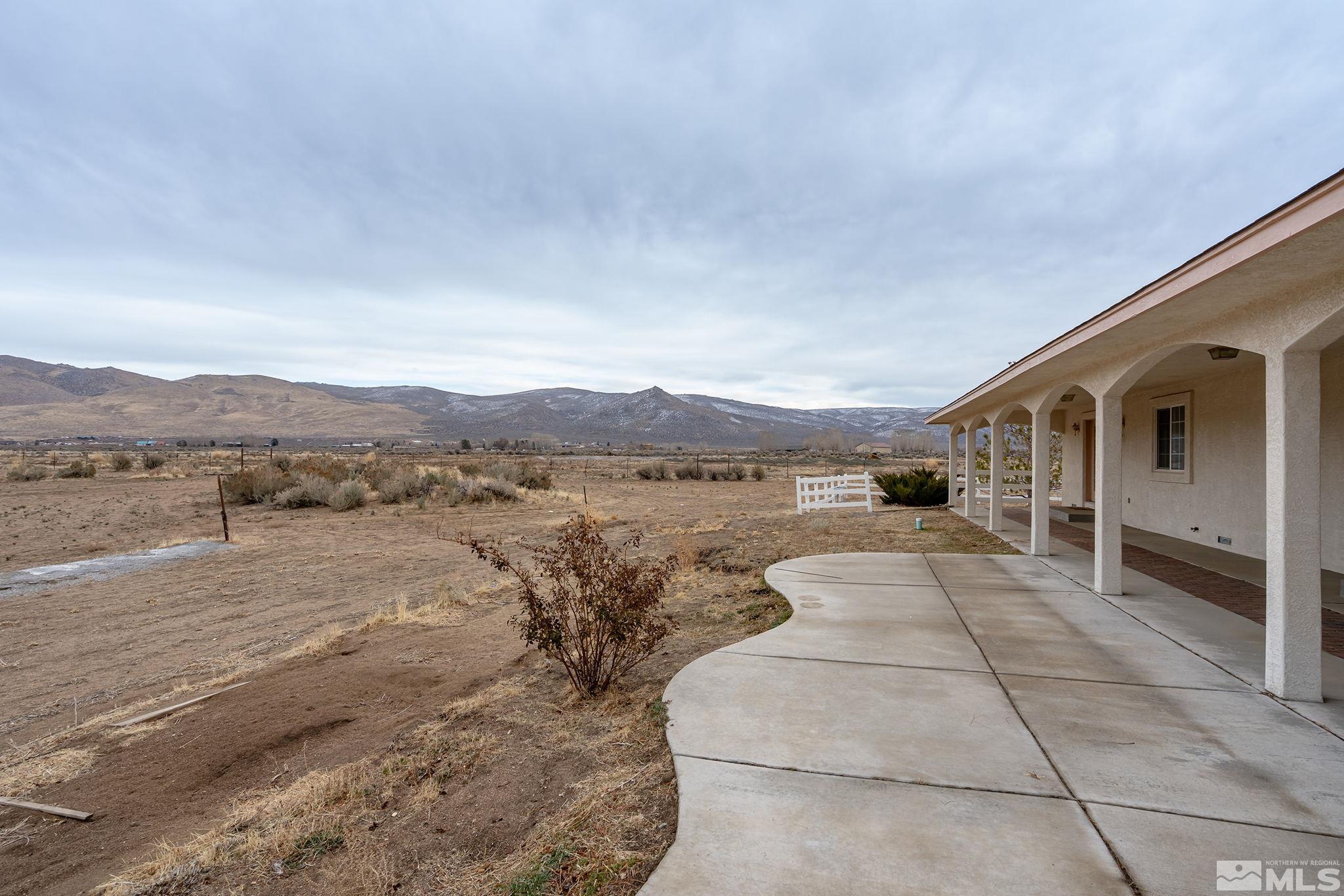 15560 North Red Rock Road Reno, NV 89508 - Photo 22 of 28 a view of a terrace with a lake view