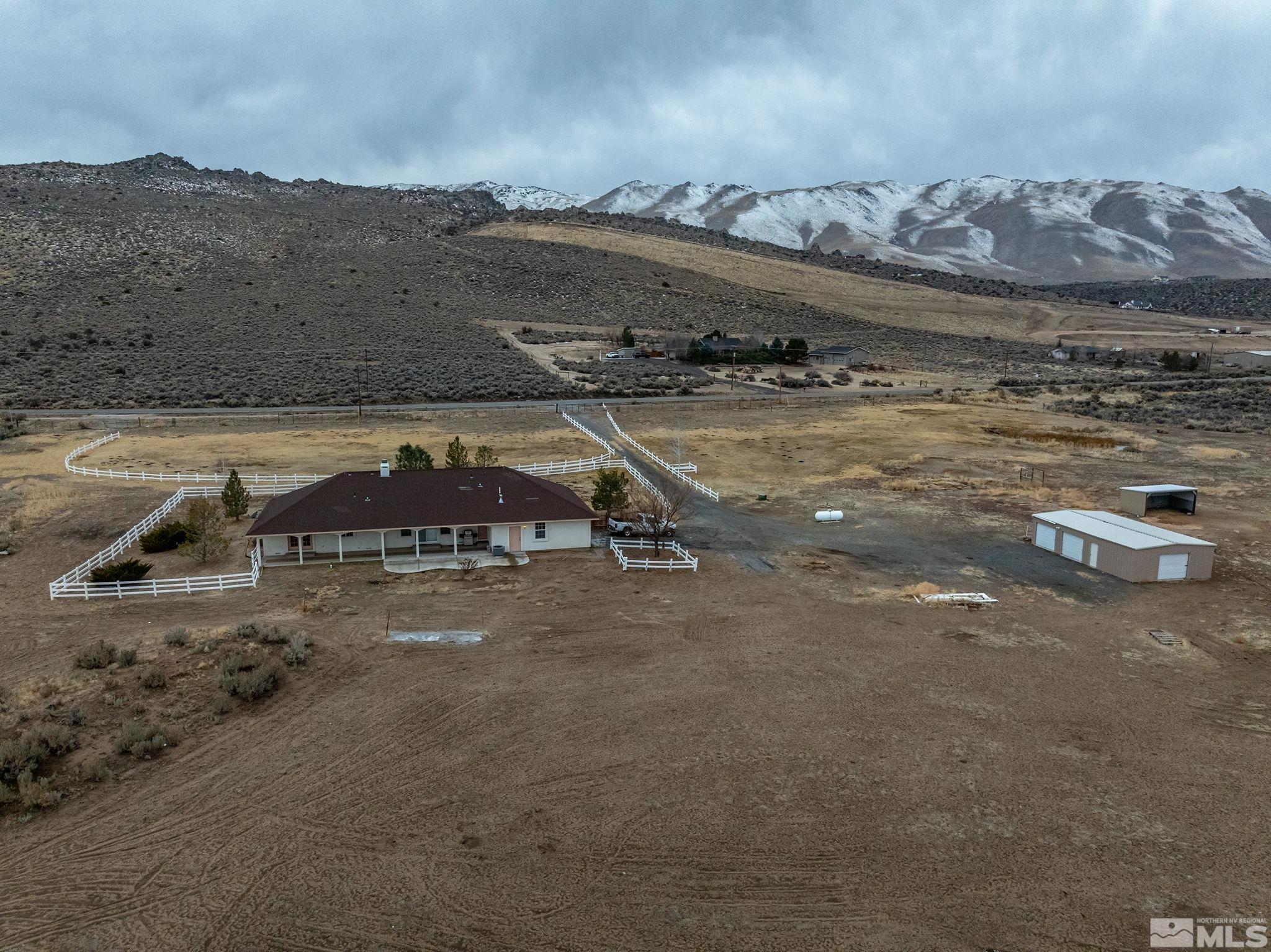 15560 North Red Rock Road Reno, NV 89508 - Photo 25 of 28 a view of a town with mountains in the background