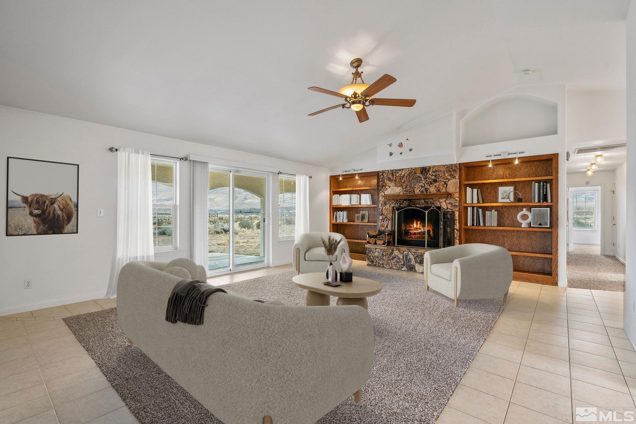 15560 North Red Rock Road Reno, NV 89508 - Photo 4 of 28 a living room with furniture and a window