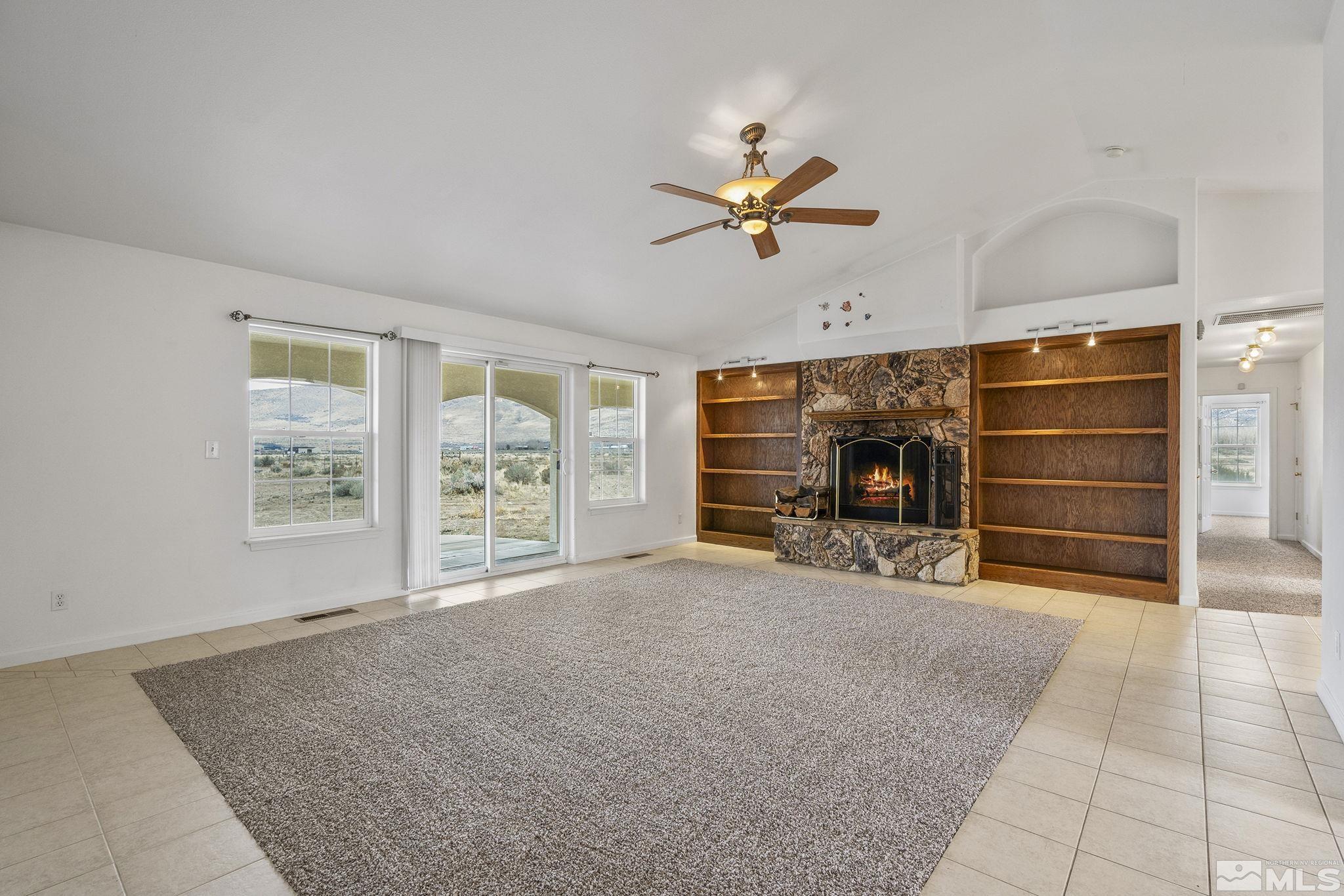 15560 North Red Rock Road Reno, NV 89508 - Photo 5 of 28 a view of a livingroom with an empty space and a window