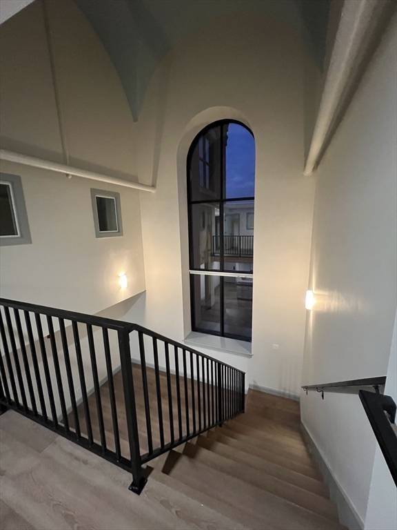 160 Seabury Street, Unit 31 Fall River, MA 02720 - Photo 13 of 14 a view of a hallway view with wooden floor and staircase