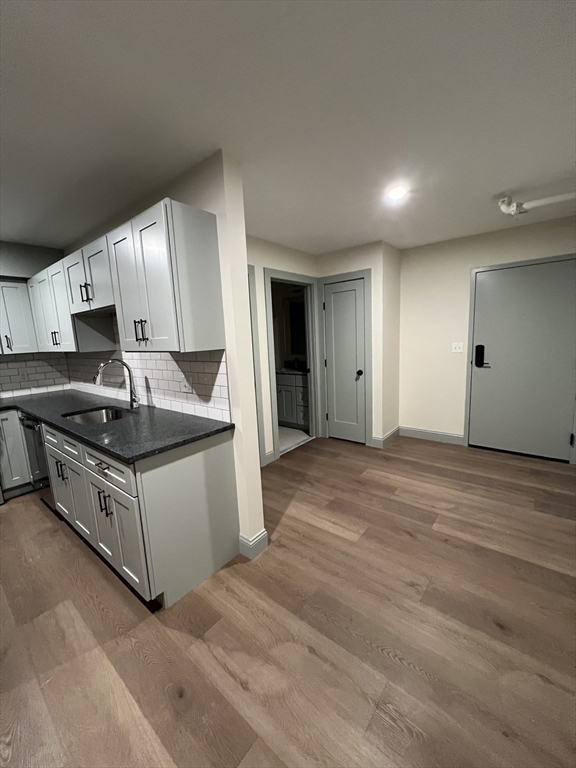 160 Seabury Street, Unit 31 Fall River, MA 02720 - Photo 8 of 14 a kitchen with stainless steel appliances granite countertop a stove a sink and a refrigerator