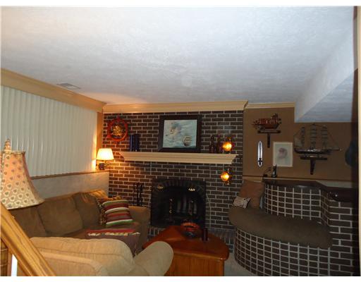 600 Moon Ridge Freedom, PA 15042 - Photo 11 of 18 Den/Family/Great Room. lower level has a wood burning FP and built in seating with storage.